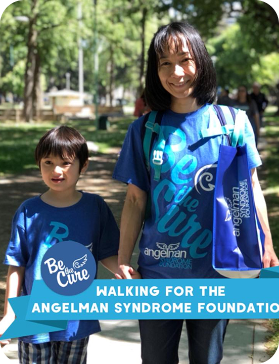 My son and me at the Angelman Syndrome Foundation walk, both in team shirts.